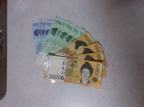 Korean currency. Makes me feel rich when I hold it. Oh wait, I am rich. :D